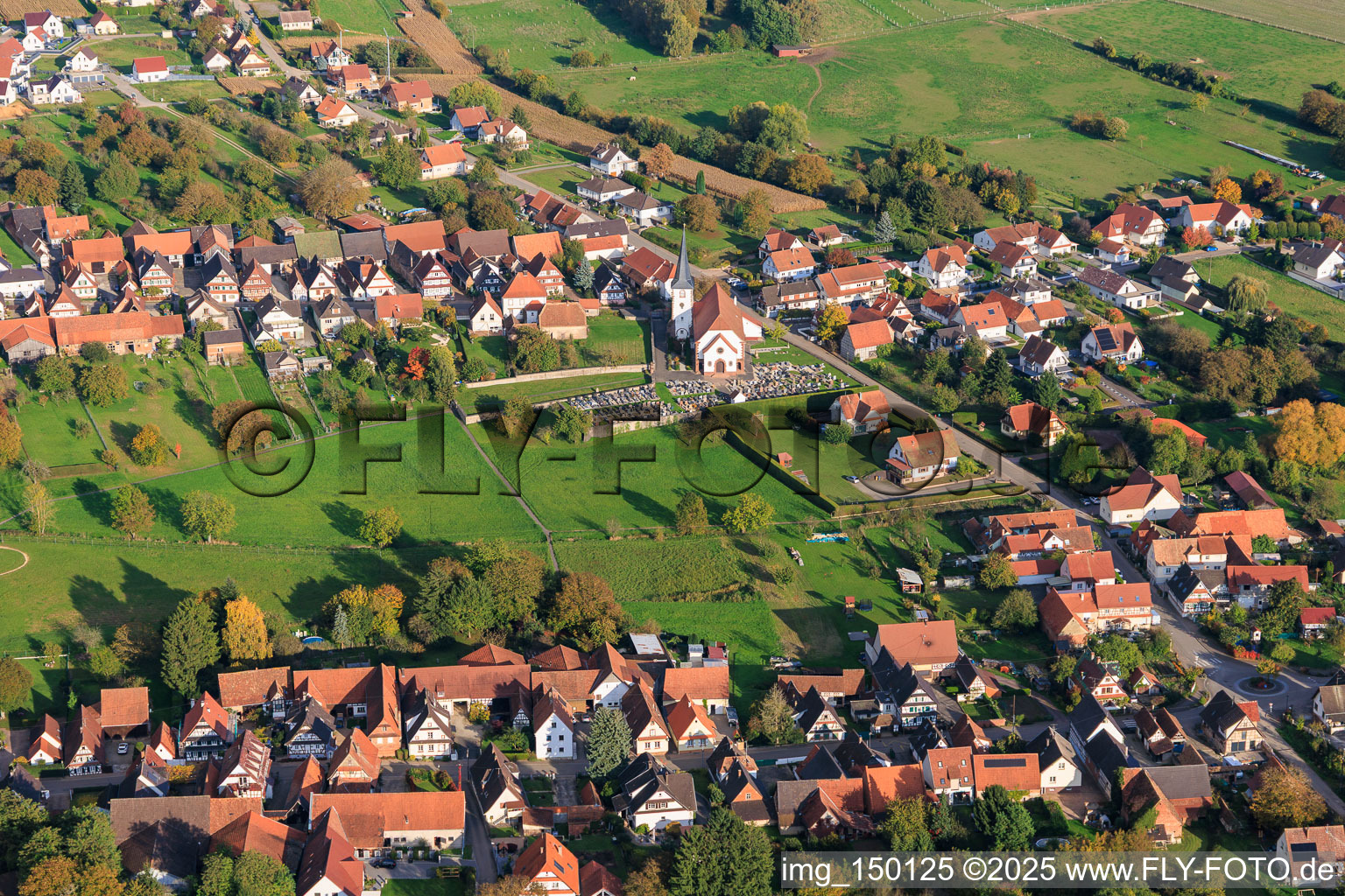 Aerial view of Church and cemetery in Seebach in the state Bas-Rhin, France