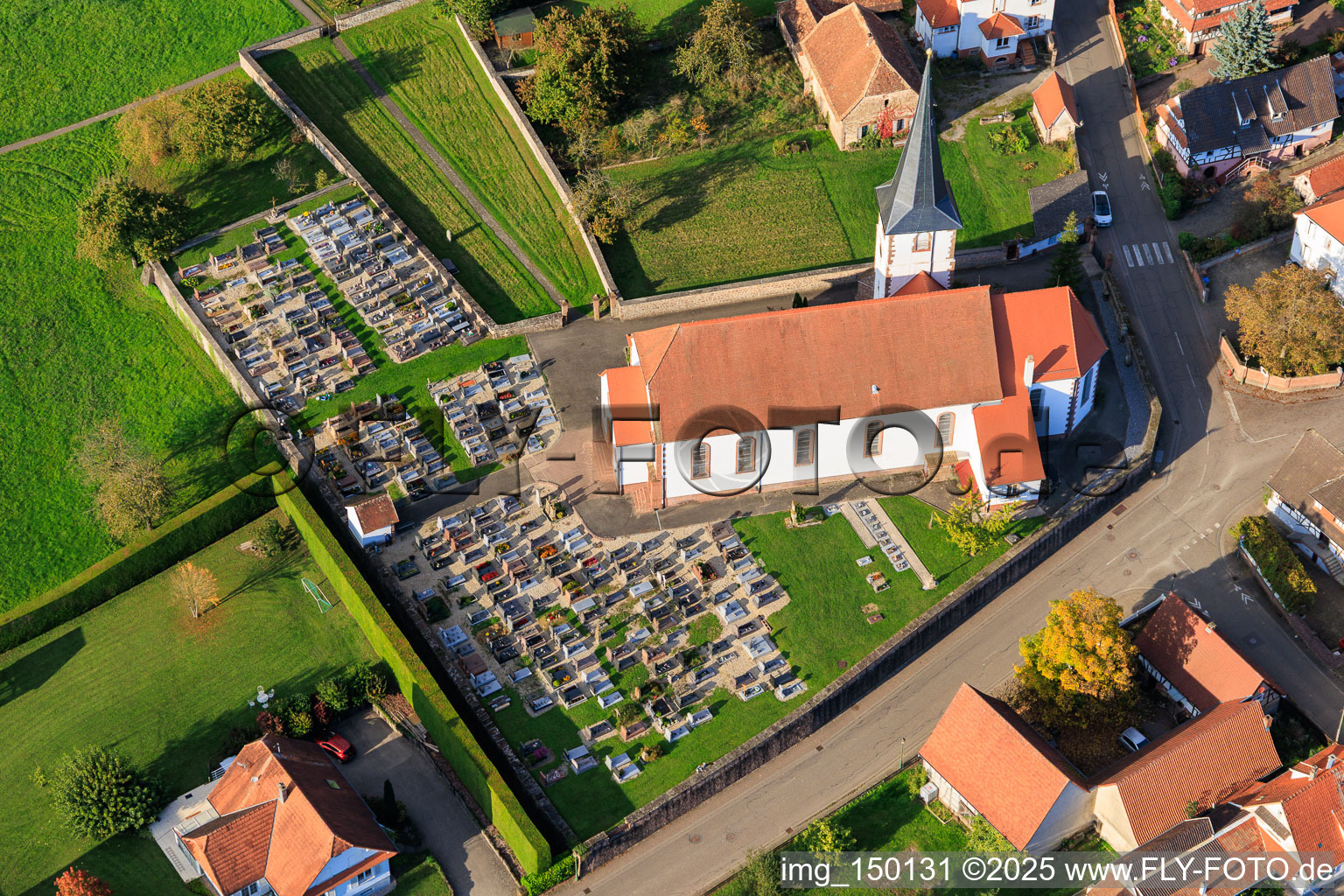 Oblique view of Church and cemetery in Seebach in the state Bas-Rhin, France