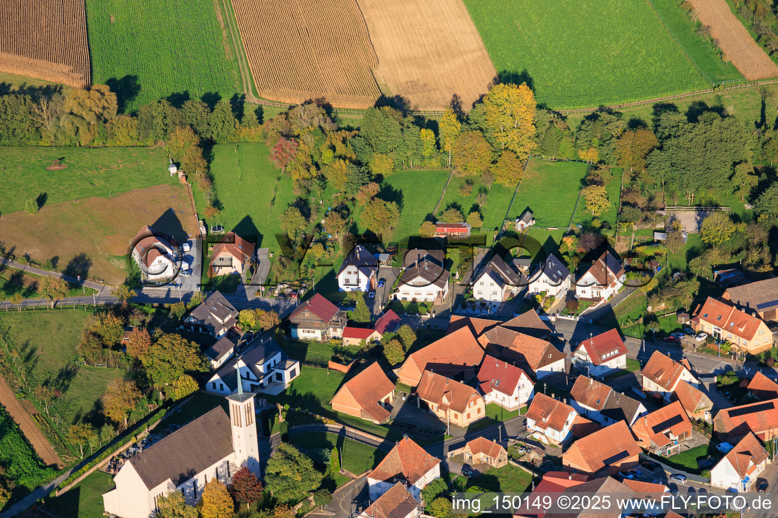 Church of St. George and Rue de Wissembourg in Oberrœdern in the state Bas-Rhin, France