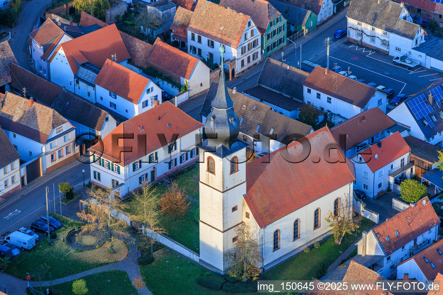 Aerial view of Protestant Church and Church Park in Freisbach in the state Rhineland-Palatinate, Germany