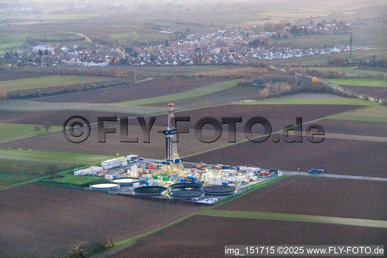 Oblique view of Vulcan Energy's V20 deep drilling site in the evening light at Schleidberg for the extraction of geothermal energy and lithium in Insheim in the state Rhineland-Palatinate, Germany