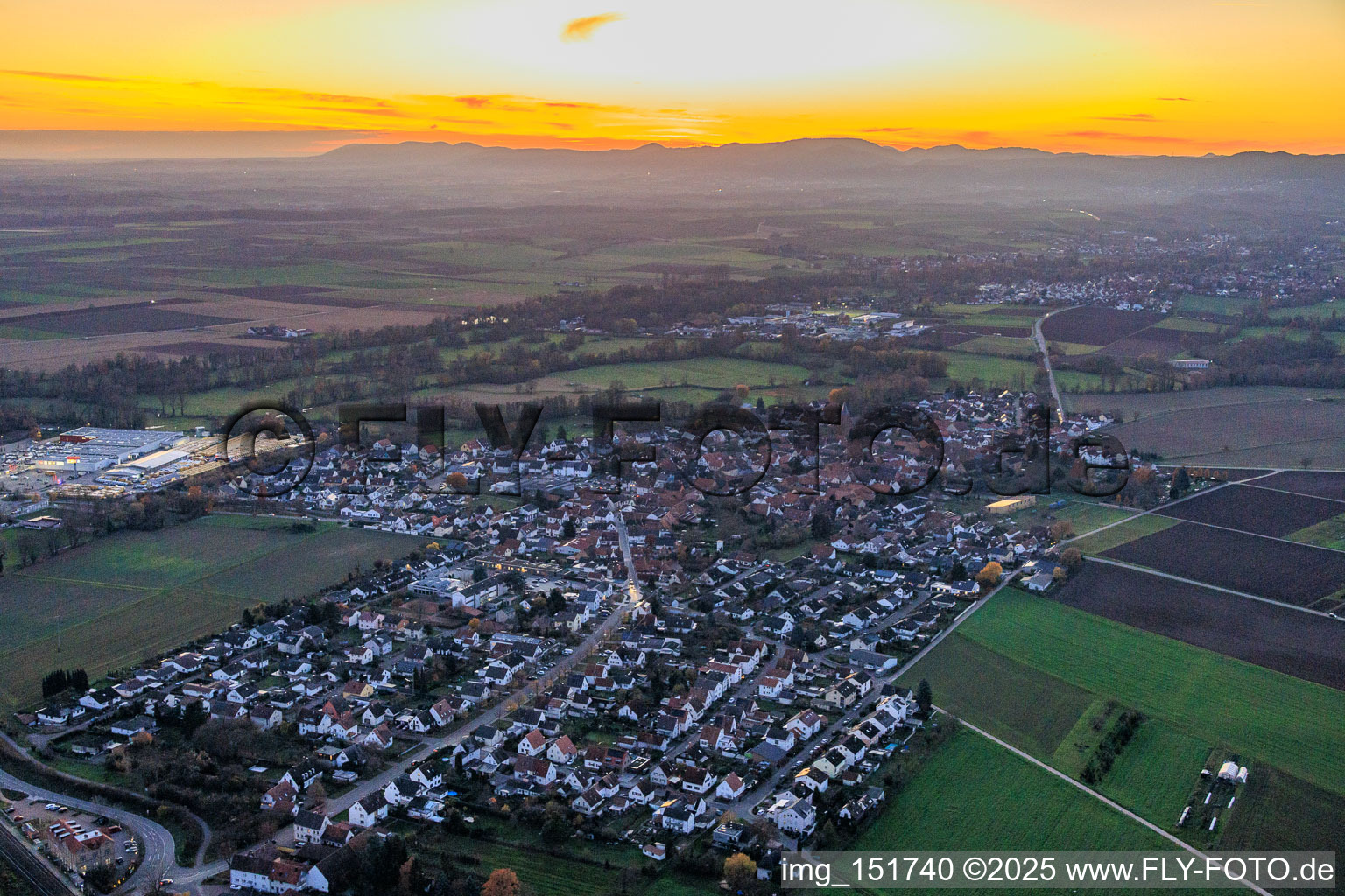 Bahnhofstrasse in the evening in Rohrbach in the state Rhineland-Palatinate, Germany
