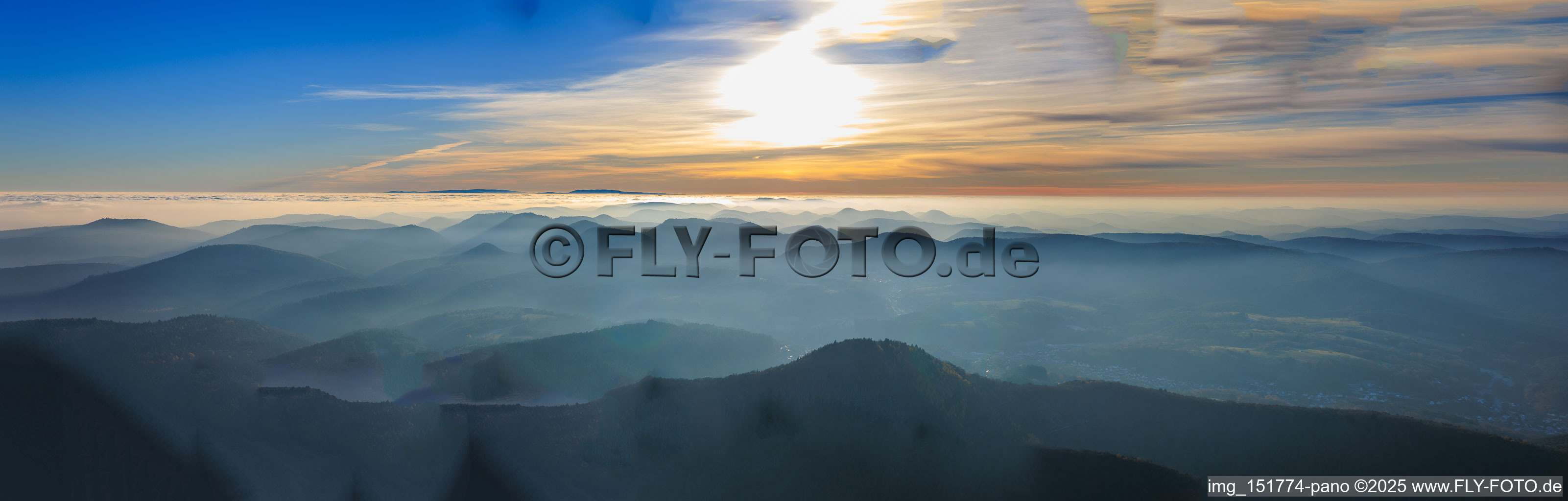 Panorama of the Palatinate Forest and the Northern Vosges Mountains in the evening haze in Nothweiler in the state Rhineland-Palatinate, Germany