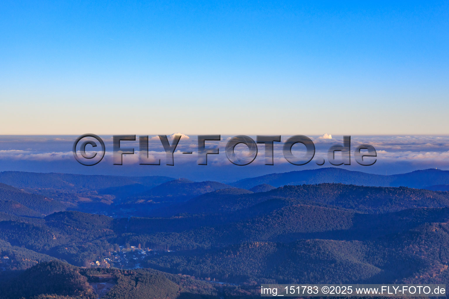 From the west in the evening in the district Lauterschwan in Erlenbach bei Dahn in the state Rhineland-Palatinate, Germany