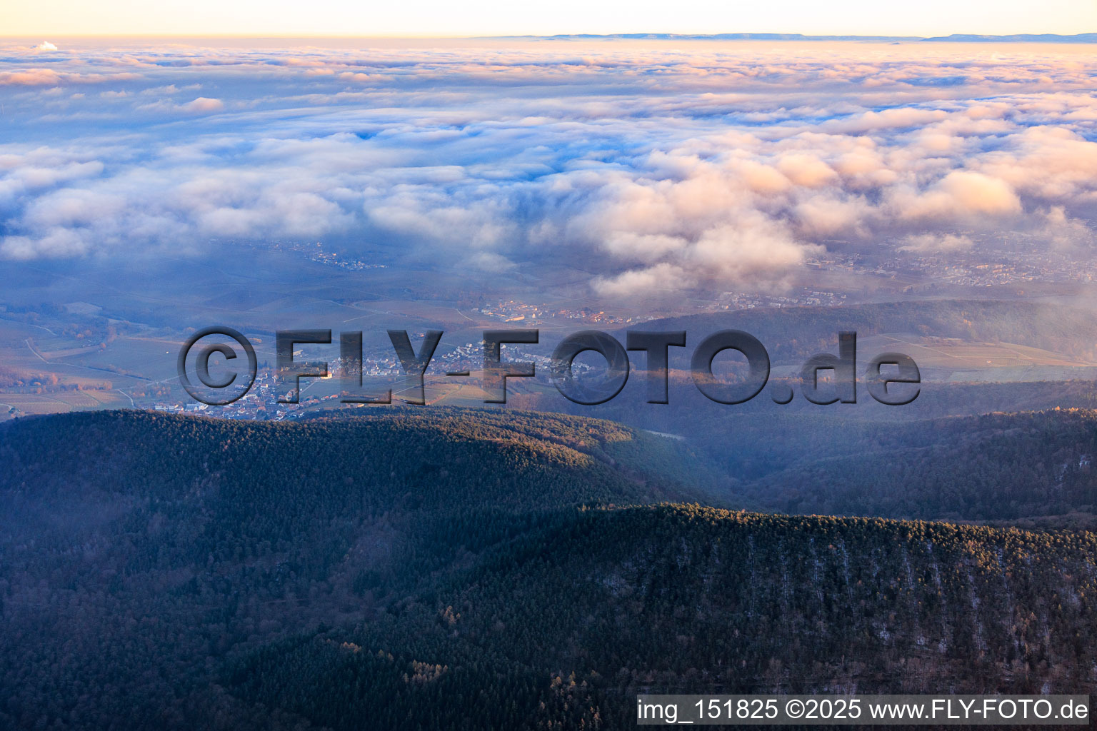 View of the town from the west, between clouds and mountains in the district Gleiszellen in Gleiszellen-Gleishorbach in the state Rhineland-Palatinate, Germany