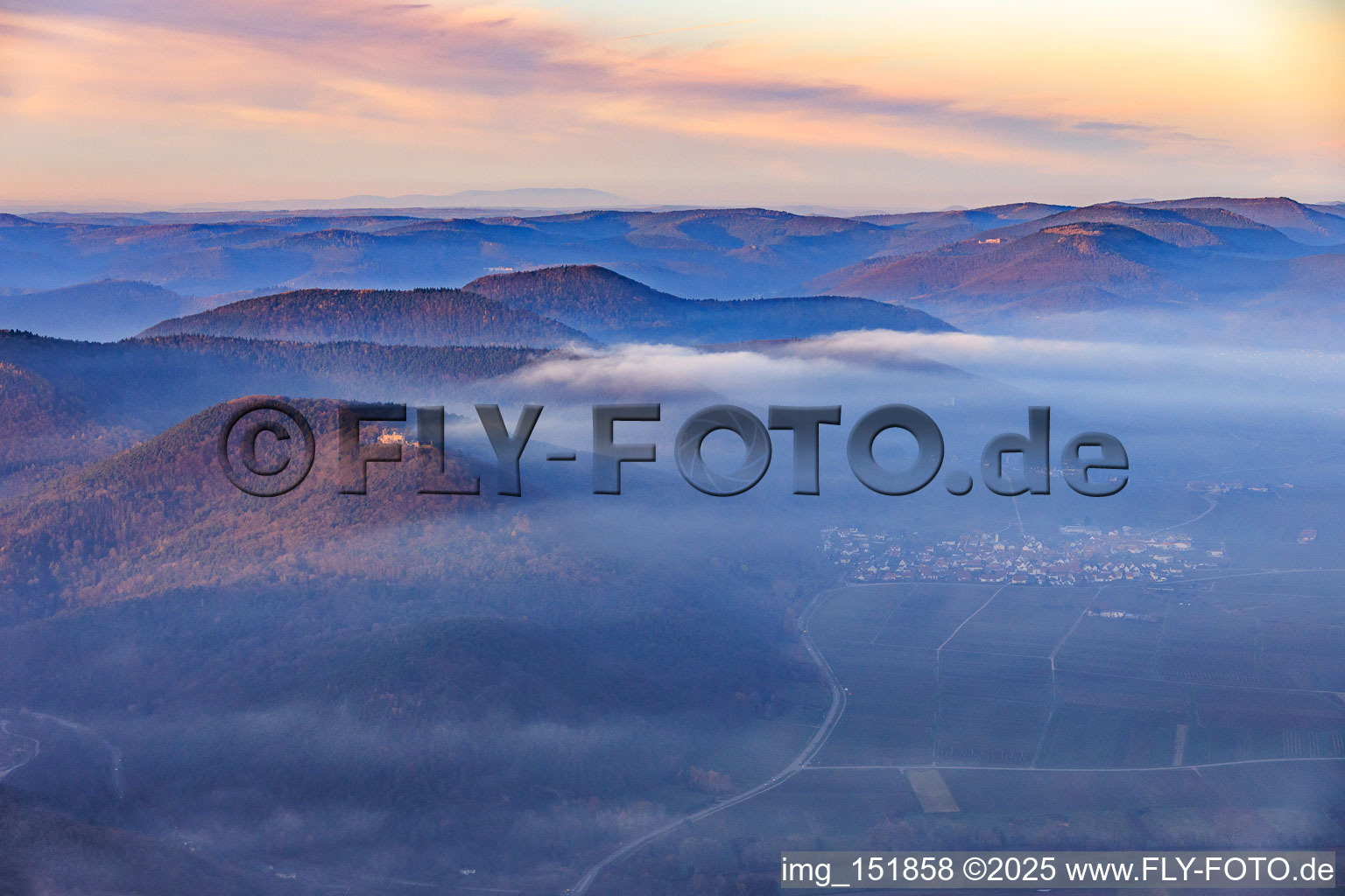 Low clouds over the wine route in Eschbach in the state Rhineland-Palatinate, Germany