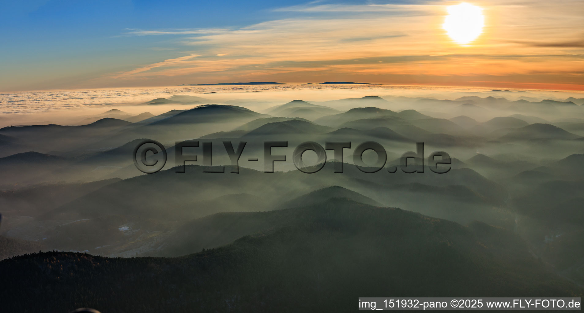 Panorama of the Palatinate Forest and Northern Vosges Mountains in the evening haze in the district Blankenborn in Bad Bergzabern in the state Rhineland-Palatinate, Germany