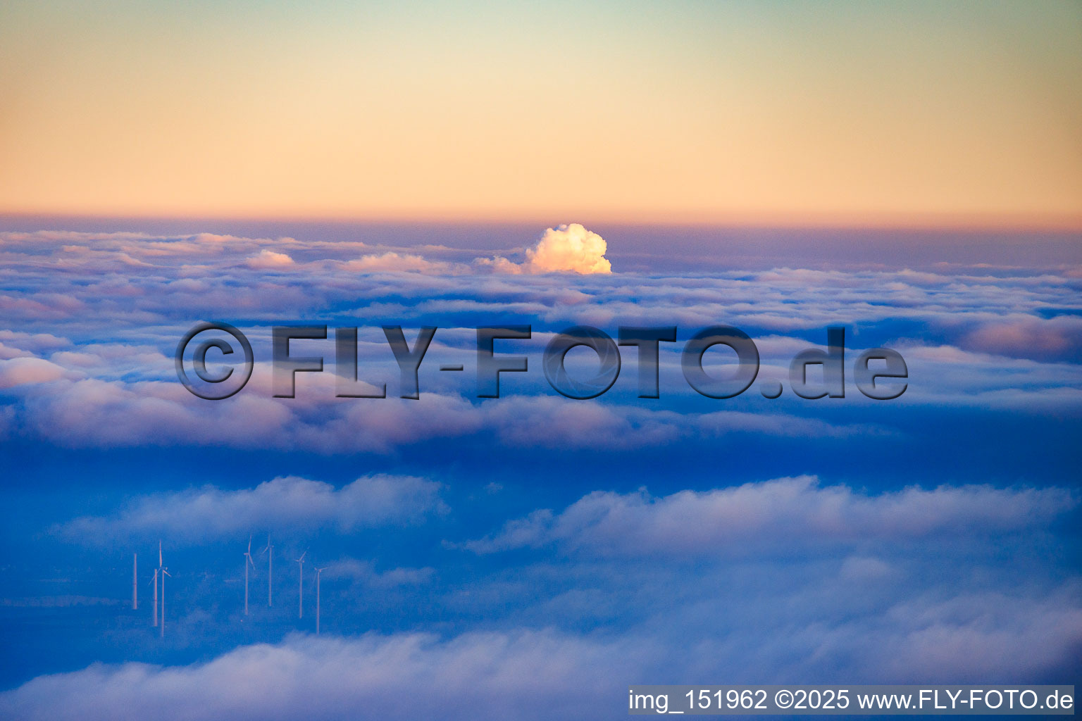 Exhaust fumes from the steam power plant Karlsruhe break through the clouds in the district Daxlanden in Karlsruhe in the state Baden-Wuerttemberg, Germany