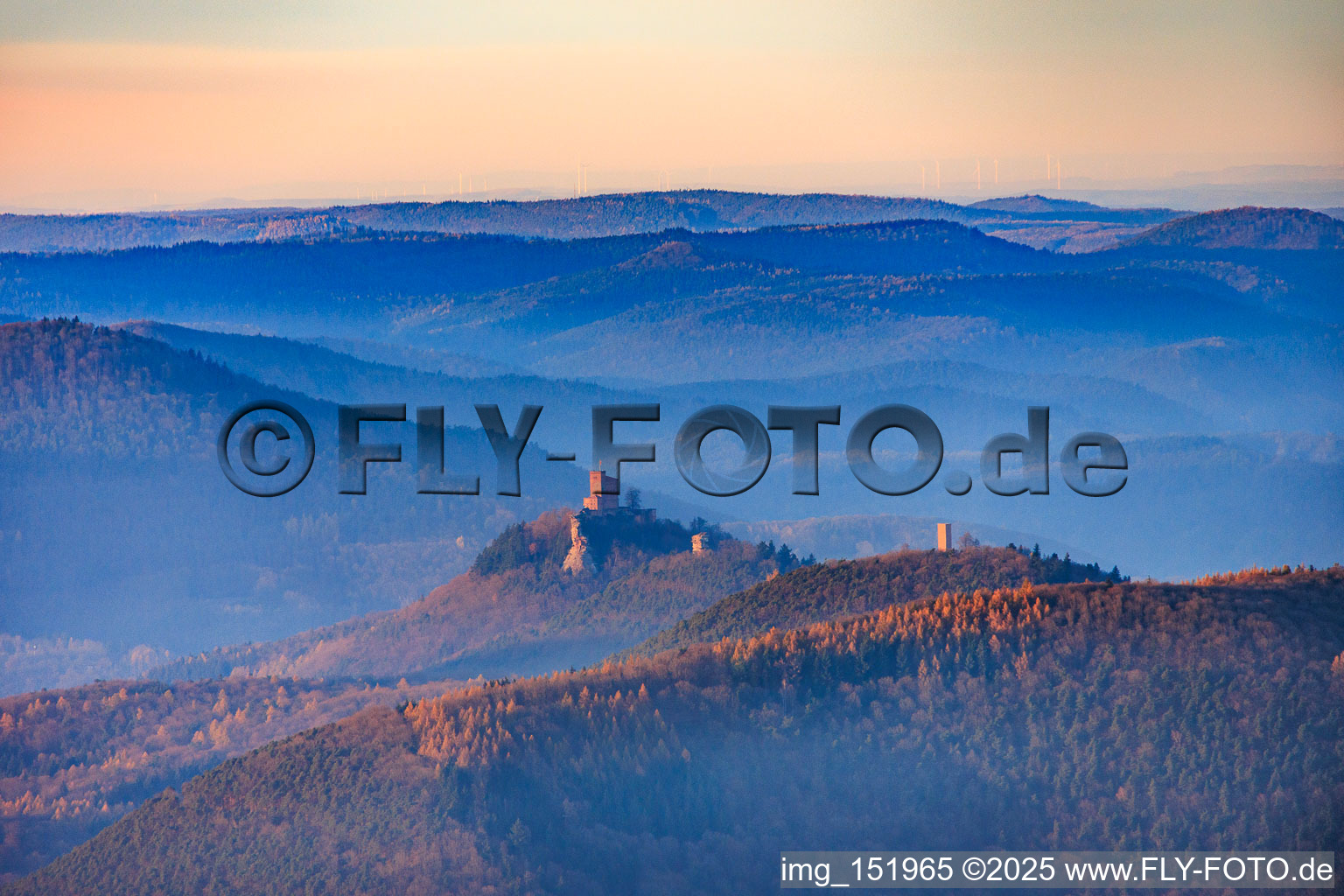 Trifels Castle in the evening - in the foreground the castle ruins of Anebos and Münz in Klingenmünster in the state Rhineland-Palatinate, Germany