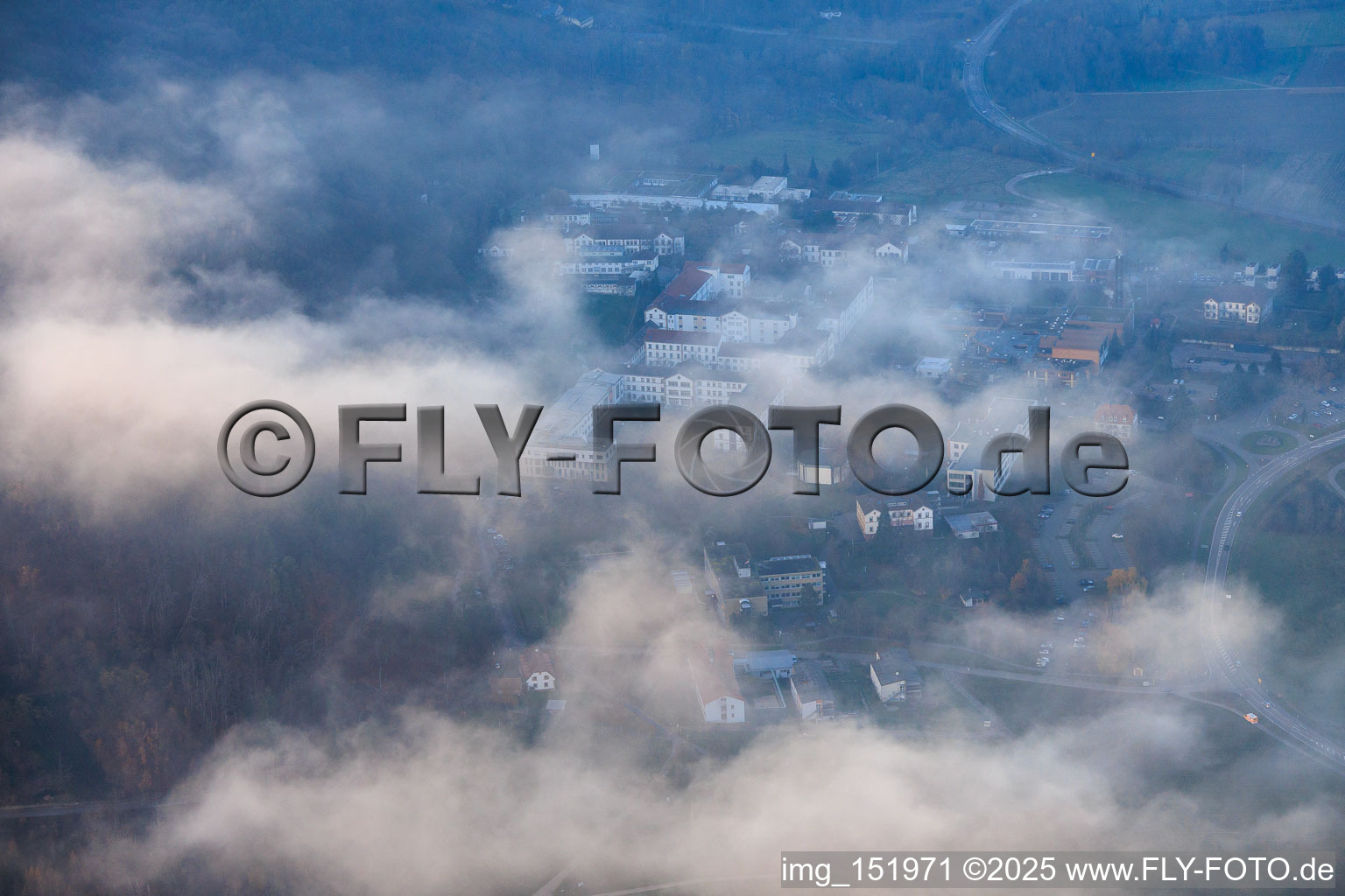 Low clouds over the Pfalzklinik Landeck in Klingenmünster in the state Rhineland-Palatinate, Germany