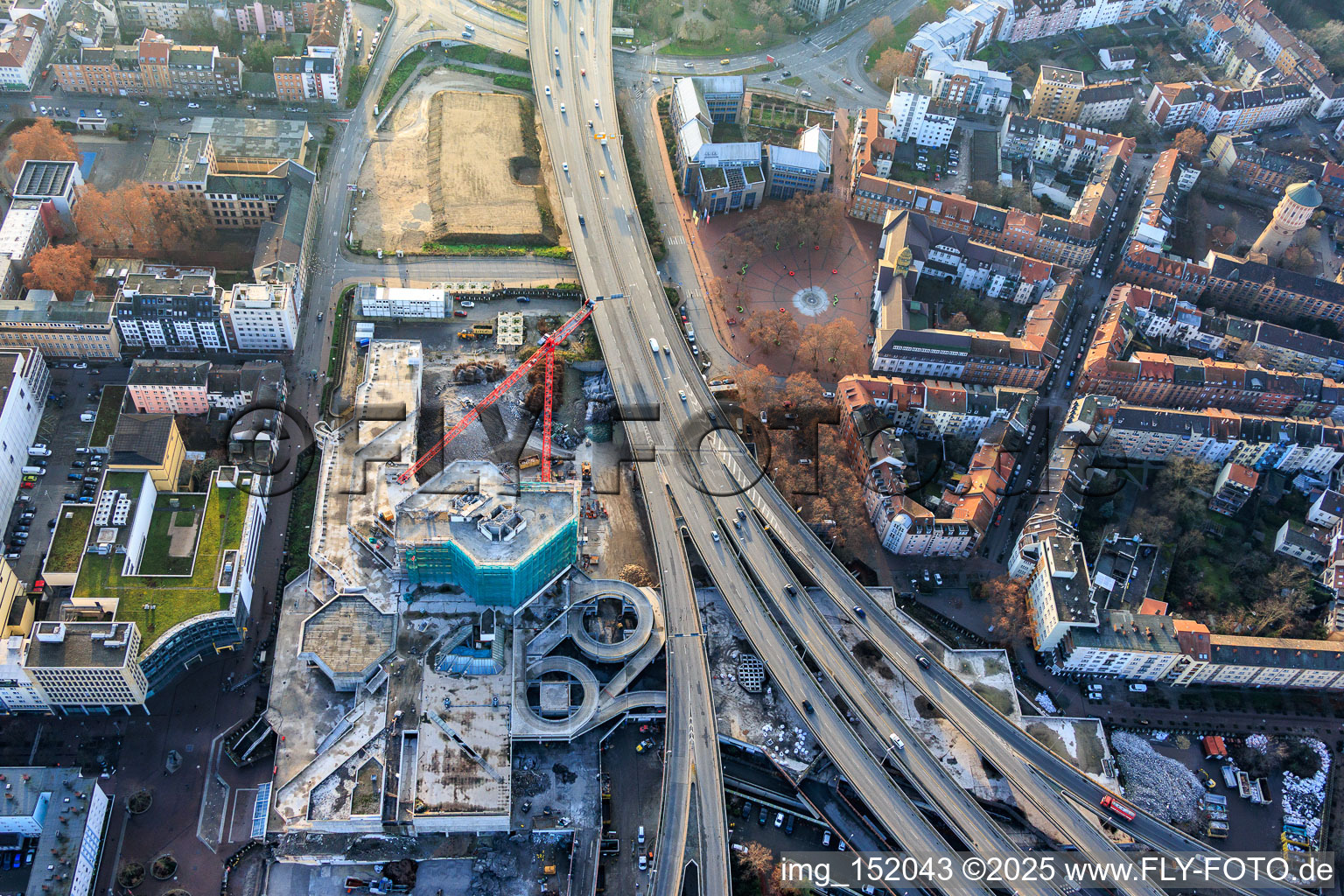 Partially demolished former Ludwigshafen town hall in the former town hall center on the still-to-be-demolished elevated highway (B44) in the district Mitte in Ludwigshafen am Rhein in the state Rhineland-Palatinate, Germany from the drone perspective