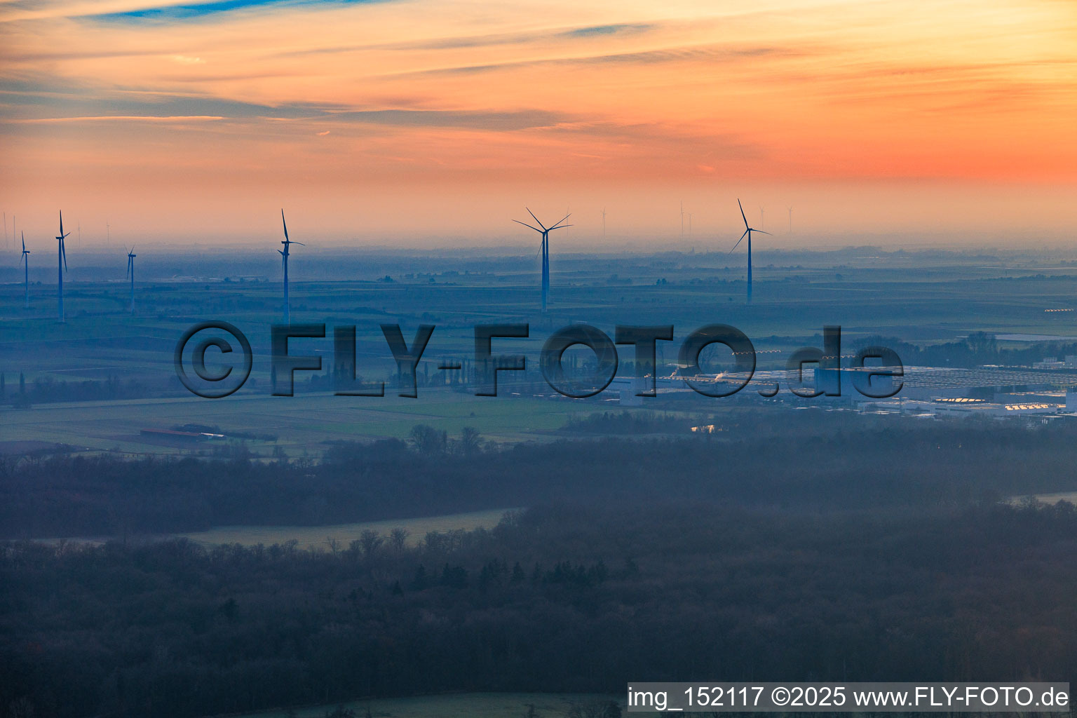 Offenbach wind farm on a foggy winter evening in Offenbach an der Queich in the state Rhineland-Palatinate, Germany