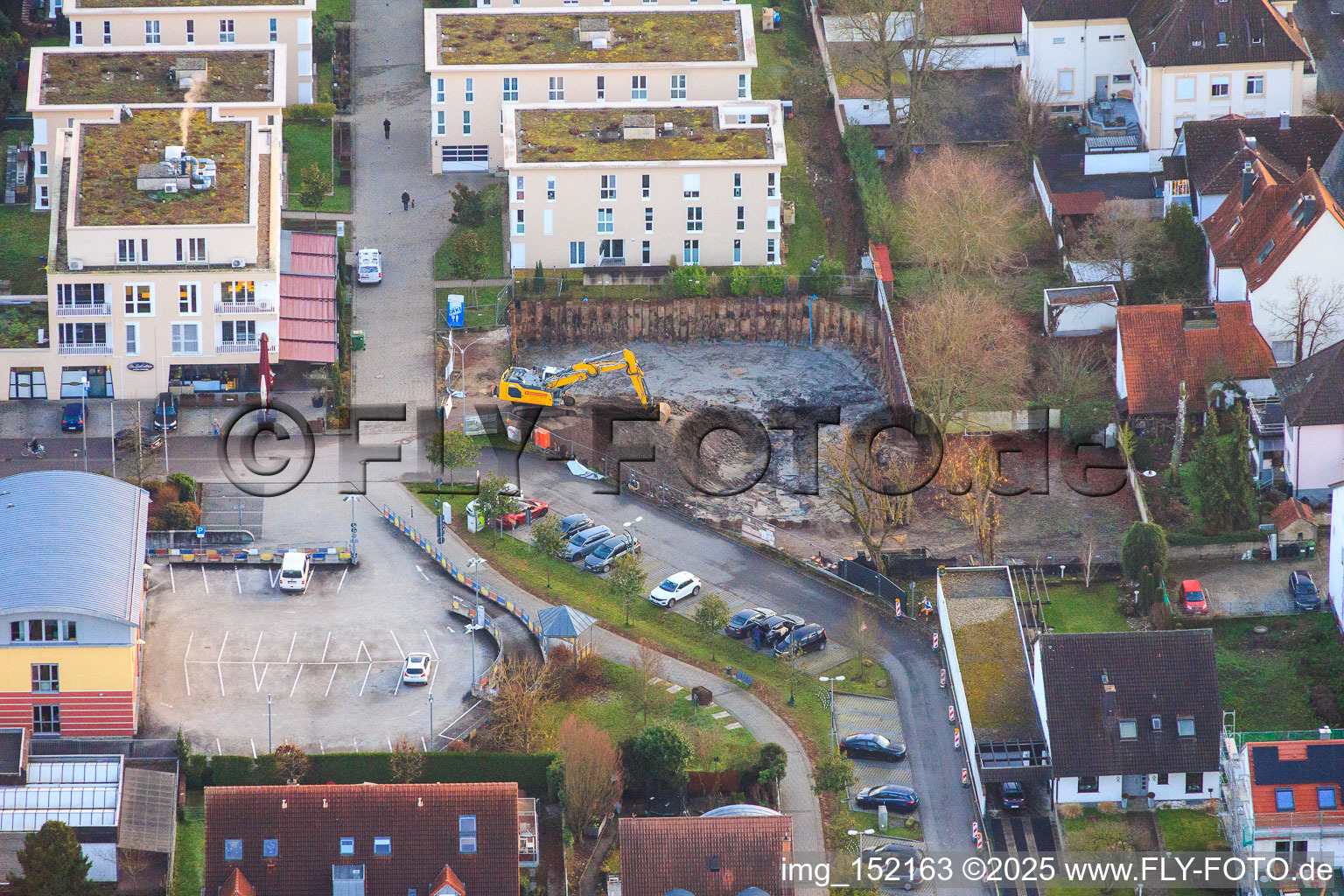 Aerial view of Construction pit for the expansion of the residential complex in the city center in Kandel in the state Rhineland-Palatinate, Germany