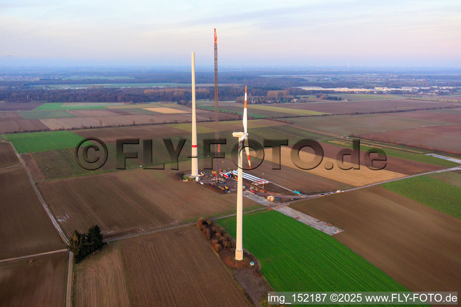 Giant crane for the repowering of the wind farm Minfeld. JUWI is replacing four old turbines (GE 1.5) from 2004 with two new, modern Vestas V162 turbines, each with six MW. in Minfeld in the state Rhineland-Palatinate, Germany from the plane