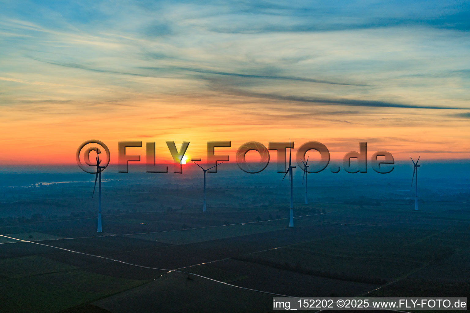 Oblique view of Sunset at the wind farm Freckenfeld in Freckenfeld in the state Rhineland-Palatinate, Germany