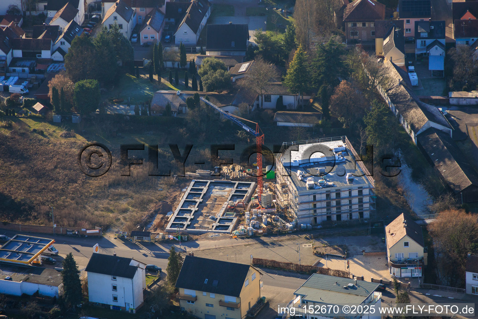 Aerial view of Construction site for apartment buildings on Neue Landstraße in Rülzheim in the state Rhineland-Palatinate, Germany
