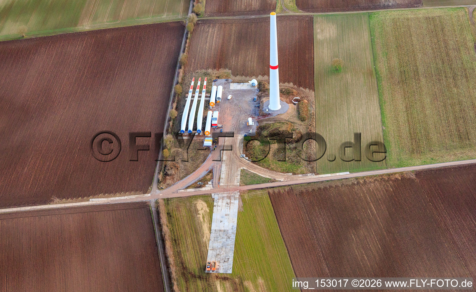 Repowering of the Minfeld wind farm. JUWI is replacing four older turbines (GE 1.5) from 2004 with two new, modern Vestas V162 turbines, each with a capacity of six MW. in Kandel in the state Rhineland-Palatinate, Germany seen from above
