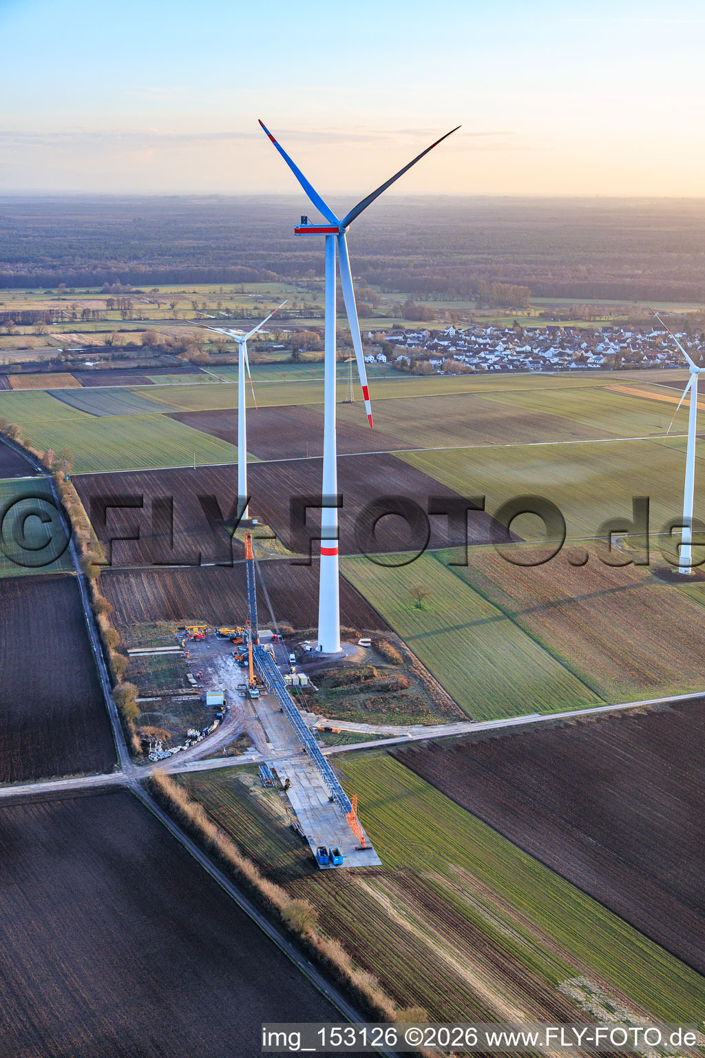Repowering of the Minfeld wind farm. JUWI is replacing four older turbines (GE 1.5) from 2004 with two new, modern Vestas V162 turbines, each with a capacity of six MW. in Kandel in the state Rhineland-Palatinate, Germany from the plane
