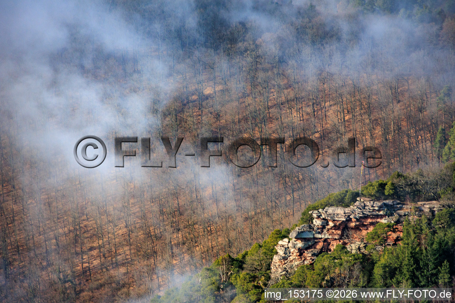 Orensfels with windsock in clouds in Frankweiler in the state Rhineland-Palatinate, Germany
