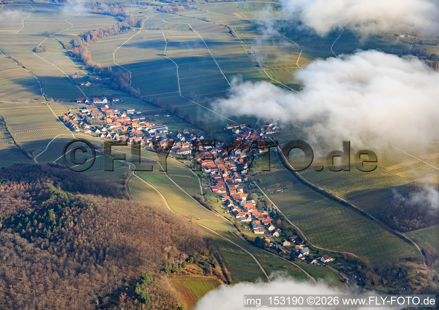 Winegrowing village under clouds from the west in Ranschbach in the state Rhineland-Palatinate, Germany