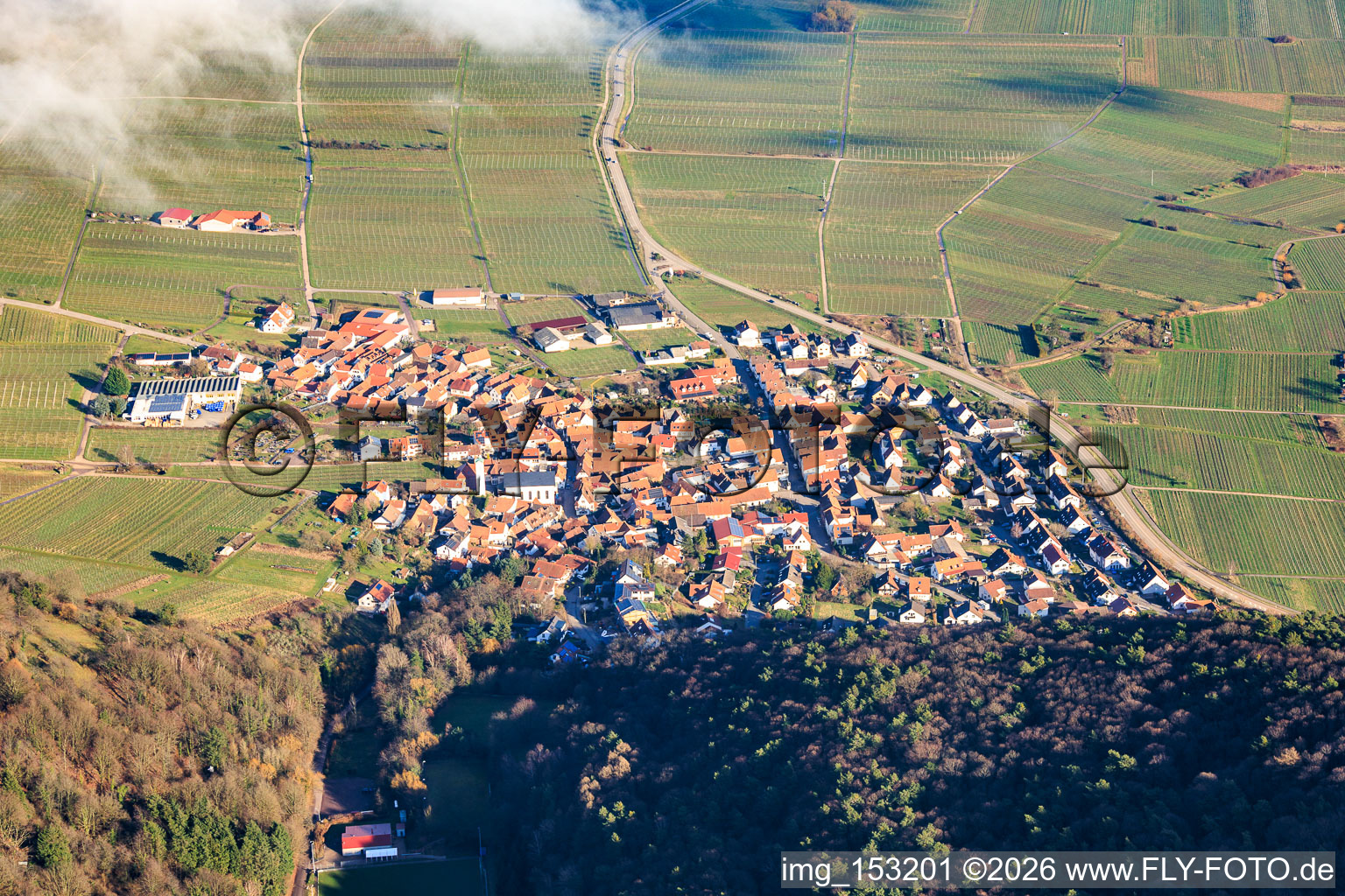 Winegrowing village under clouds from the west in Eschbach in the state Rhineland-Palatinate, Germany