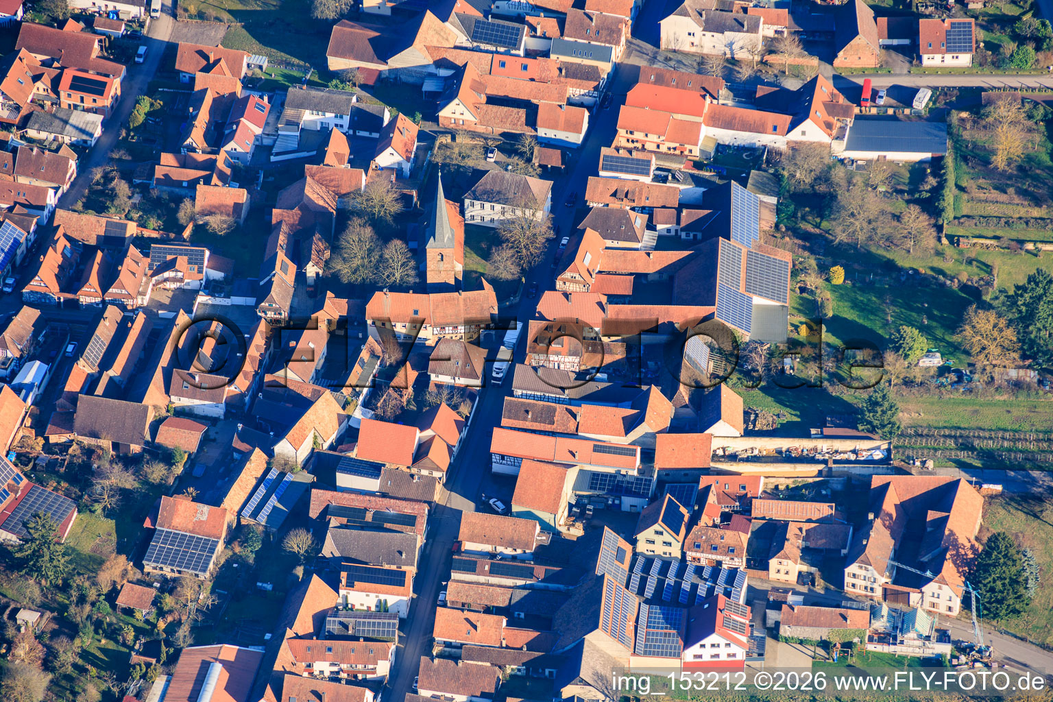 Village center with church in the district Heuchelheim in Heuchelheim-Klingen in the state Rhineland-Palatinate, Germany