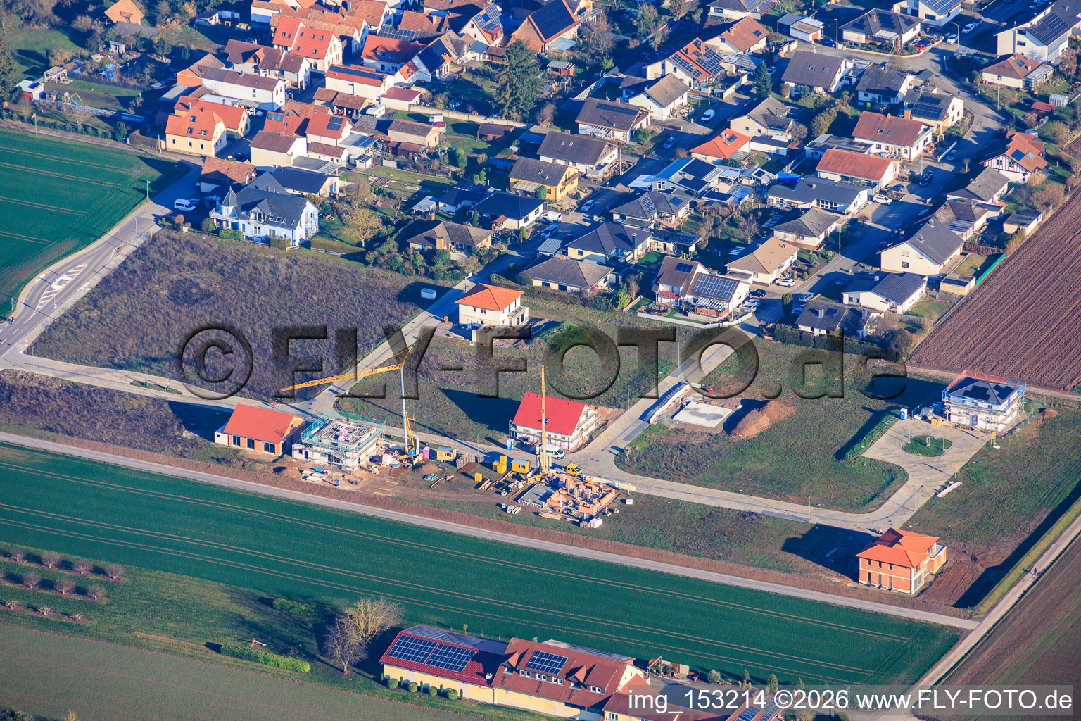 Three construction sites for apartment buildings in the new development area Im Niederfeld in the district Ingenheim in Billigheim-Ingenheim in the state Rhineland-Palatinate, Germany