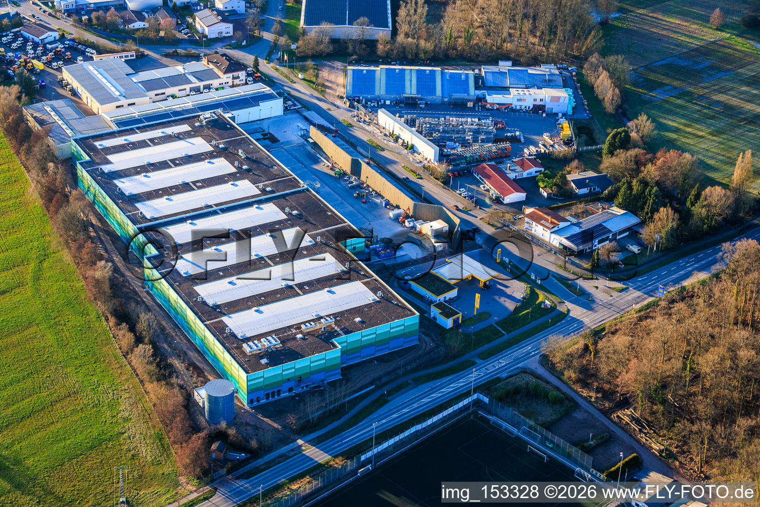 Almost completed new building of the logistics park by HANSAINVEST and DFI-Real-Estate Kandel for FRISCHEPLATTFORM SÜDWEST of Gemüsering Stuttgart GmbH in the district Minderslachen in Kandel in the state Rhineland-Palatinate, Germany seen from above