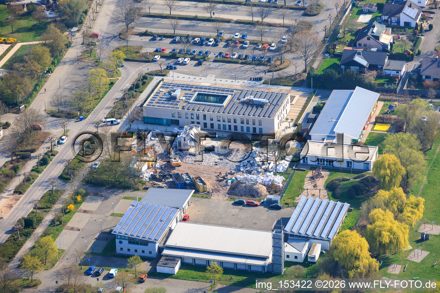 Demolition of the old town hall Offenbach an der Queich between fire station, municipal daycare center Queichhüpfer and new town hall building in Offenbach an der Queich in the state Rhineland-Palatinate, Germany