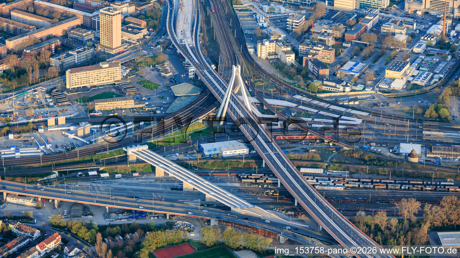 Pylon bridge of the B37 over the train station and bridge construction site for the connection of the elevated highway south at the main train station in the district Mitte in Ludwigshafen am Rhein in the state Rhineland-Palatinate, Germany