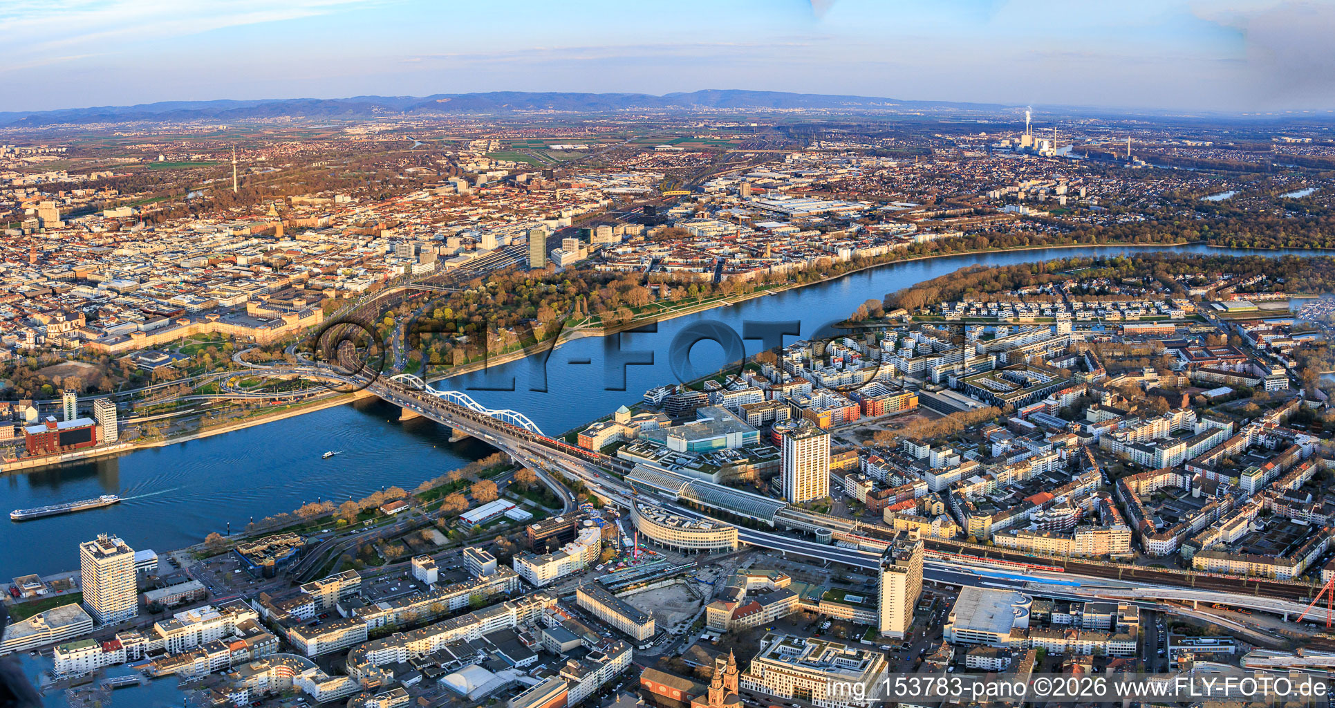 City panorama from the northwest on the Rhine riverbank from Zollhof to Parkinsel with Konrad-Adenauer-Brücke and Berliner Platz in the district Mitte in Ludwigshafen am Rhein in the state Rhineland-Palatinate, Germany