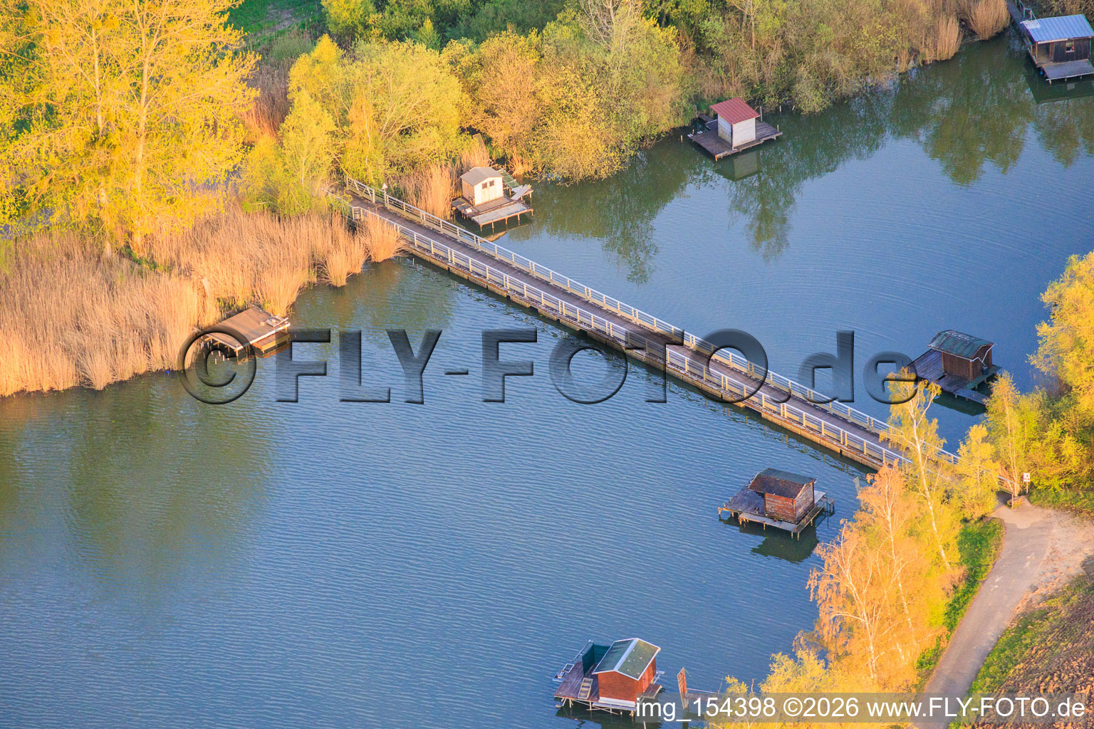 Bridge over the eastern end of Lake Etang du Welschhof in Puttelange-aux-Lacs in the state Moselle, France