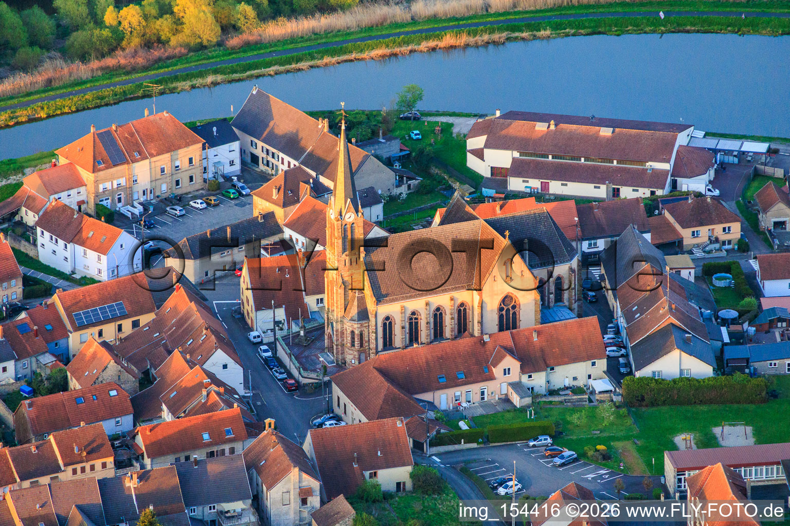 Saint-Etienne Church in the evening light in Wittring in the state Moselle, France