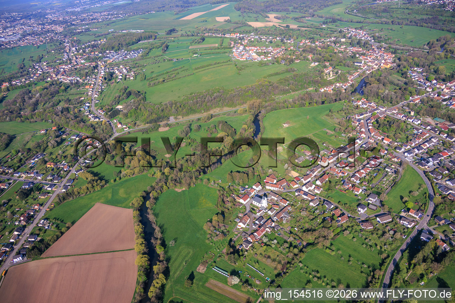 Course of the Blies river at the German-French border and St. Martin's Church Habkirchen in the district Habkirchen in Mandelbachtal in the state Saarland, Germany