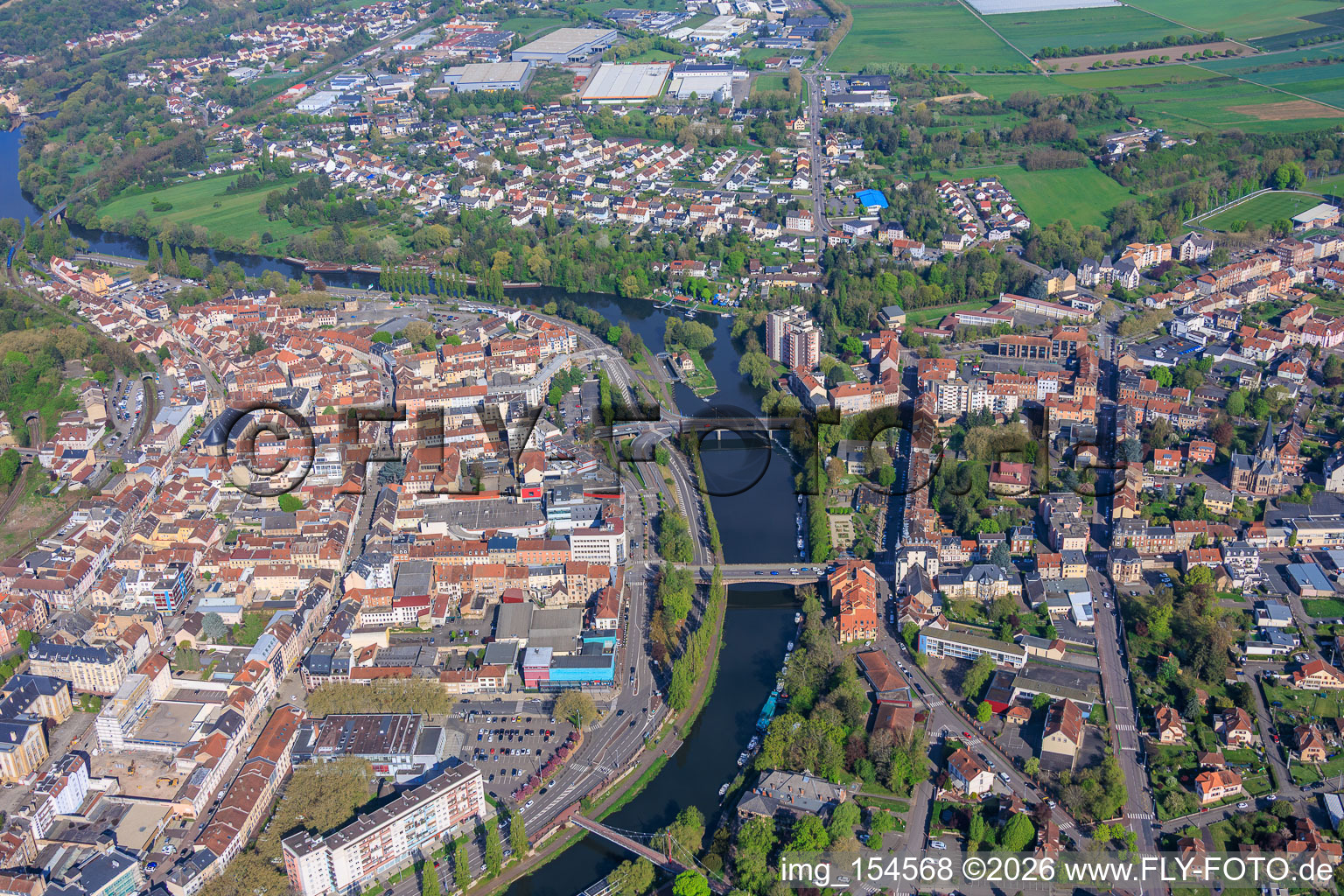 City overview on the banks of the Saar River from the south in Saargemünd in the state Moselle, France