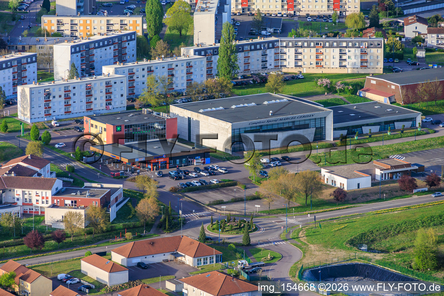 Complexe Sportif Marcel Cerdan and the prefab housing development on Av. Victor Hugo in Farébersviller in the state Moselle, France