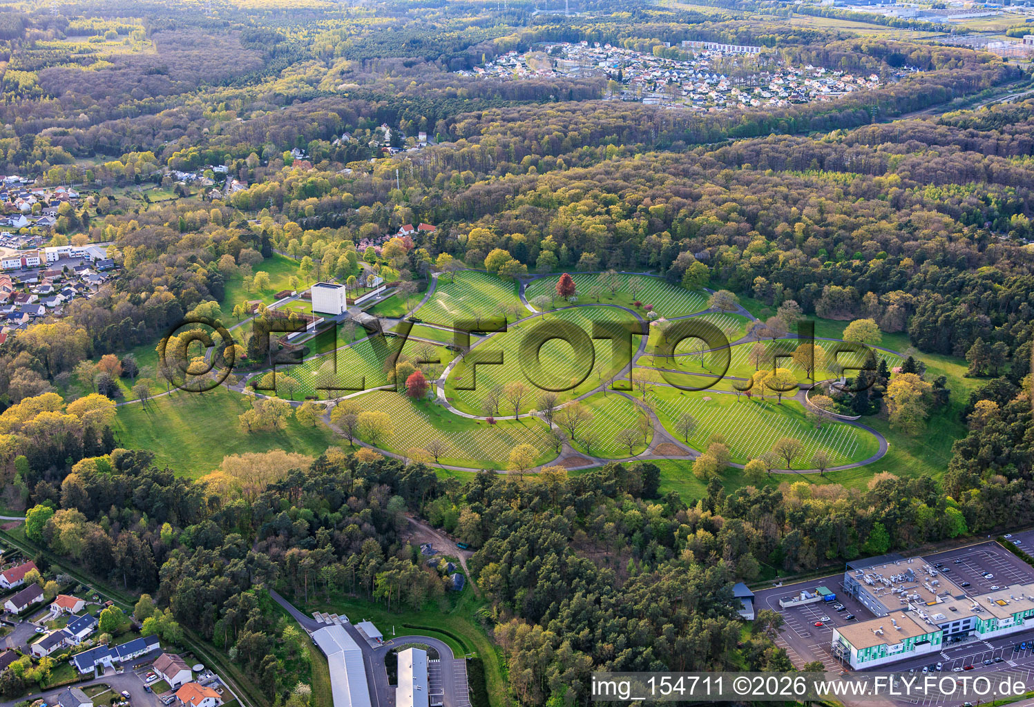 Gravestone rows and parkland at the American Military Cemetery and Memorial Site of Saint-Avold in the district Forêts de Zang et du Steinberg in Saint-Avold in the state Moselle, France