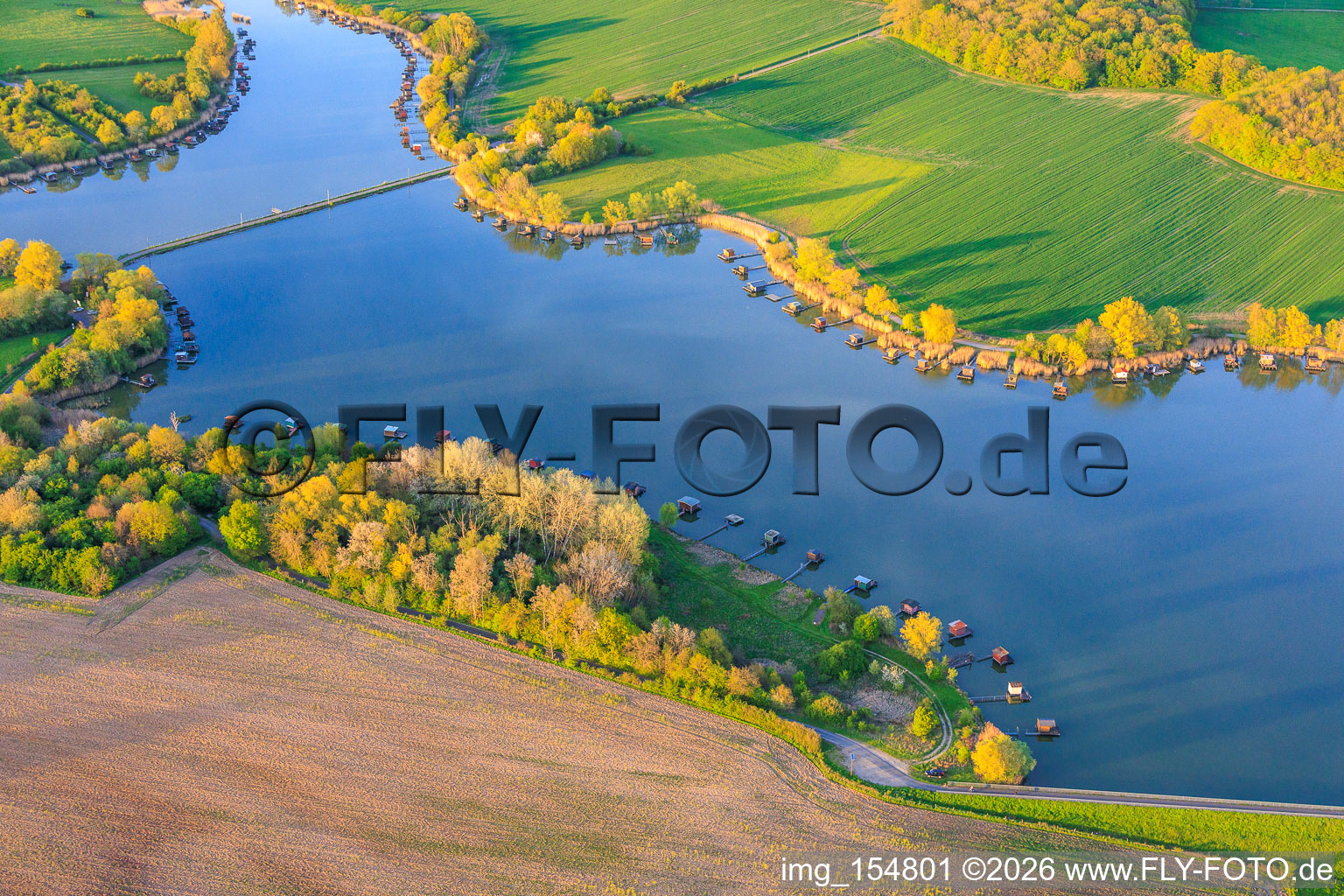 Bridge over the lake Etang du Welschhof in Puttelange-aux-Lacs in the state Moselle, France