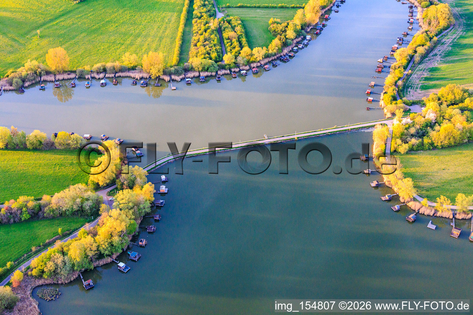Bridge over the lake Etang du Welschhof in Puttelange-aux-Lacs in the state Moselle, France