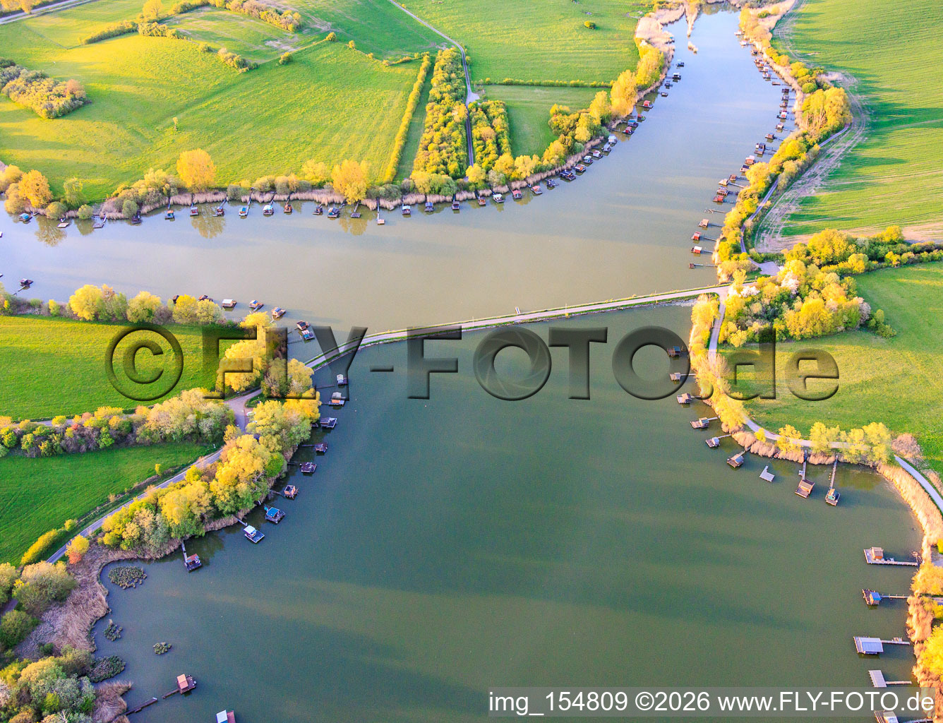 Bridge over the lake Etang du Welschhof in Puttelange-aux-Lacs in the state Moselle, France