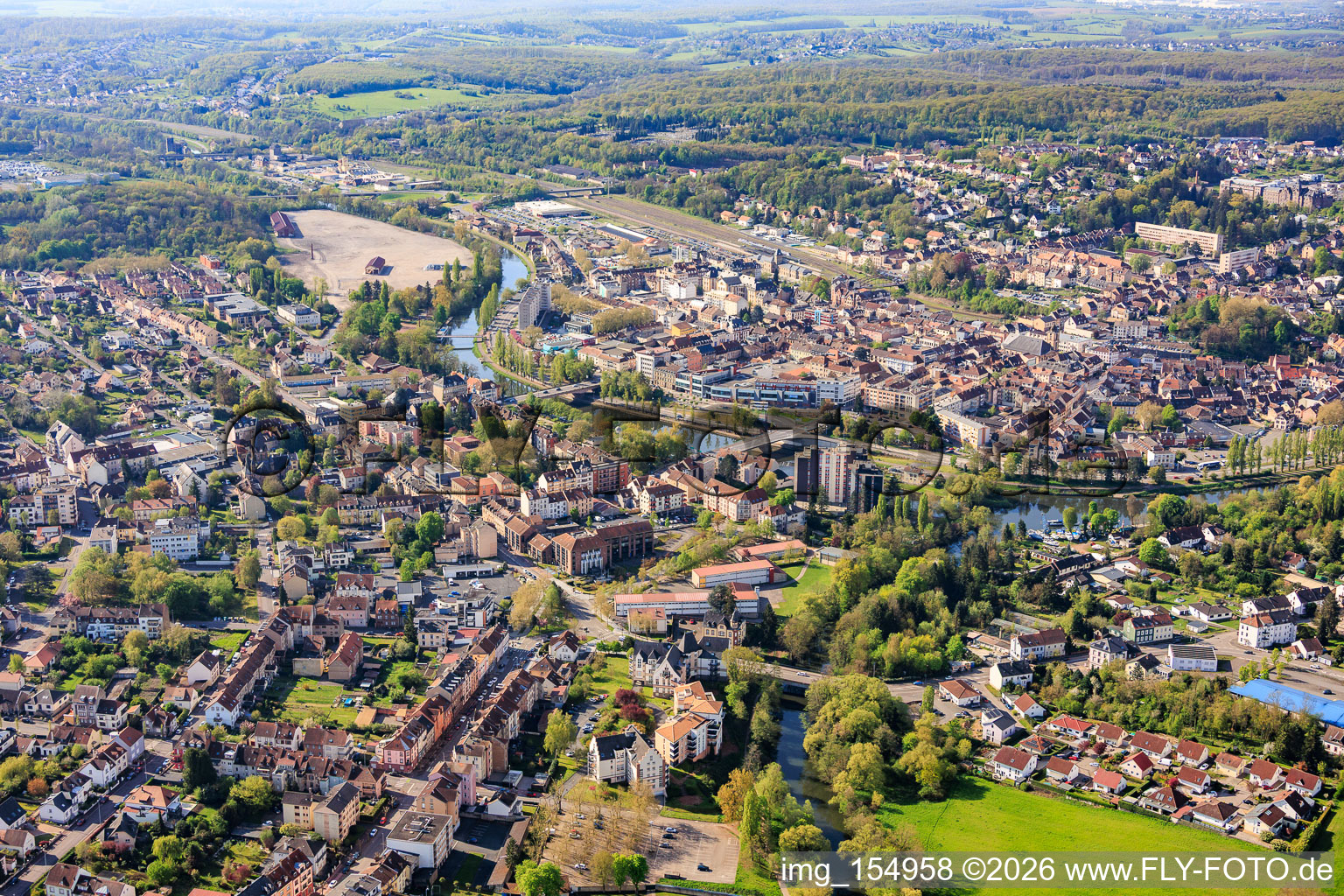 City view from the north with the Blies estuary and bridges over the Saar in the district Blies Sud in Saargemünd in the state Moselle, France