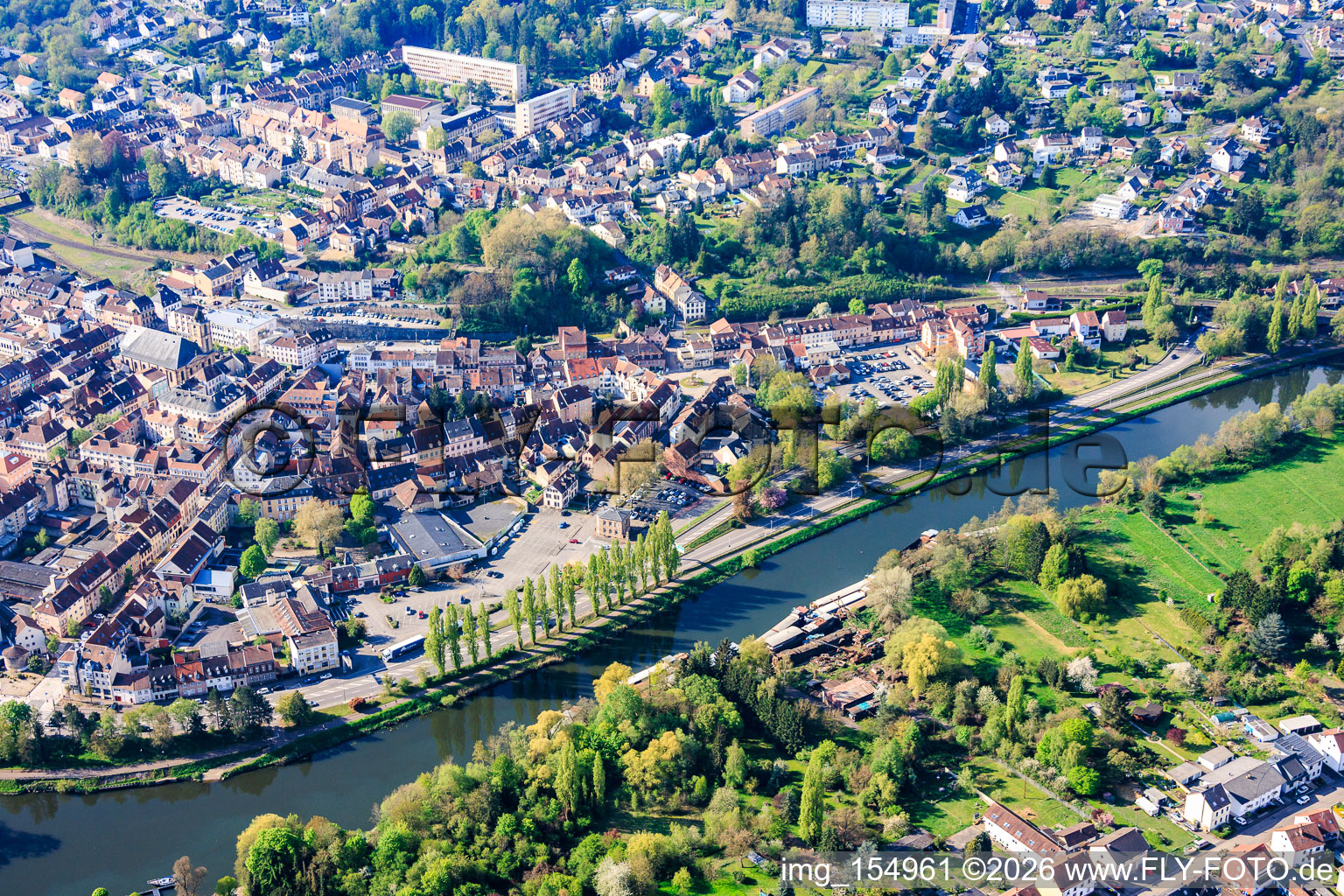 Poplar trees on the banks of the Saar River along Rue du Bac in Saargemünd in the state Moselle, France