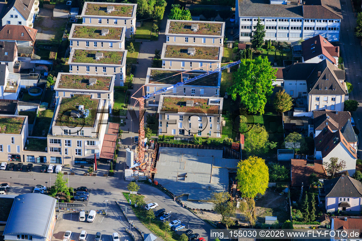 Construction site with completed basement for the expansion of the residential complex in the city center in Kandel in the state Rhineland-Palatinate, Germany