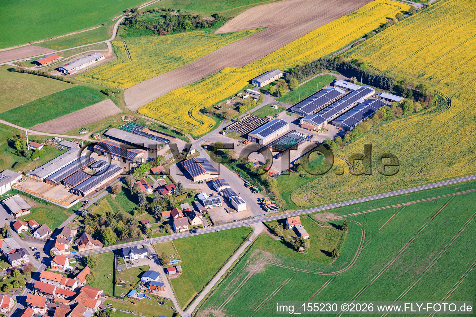 Buildings and halls of the Agricultural Production and Sales AG in the district Hellingen in Heldburg in the state Thuringia, Germany