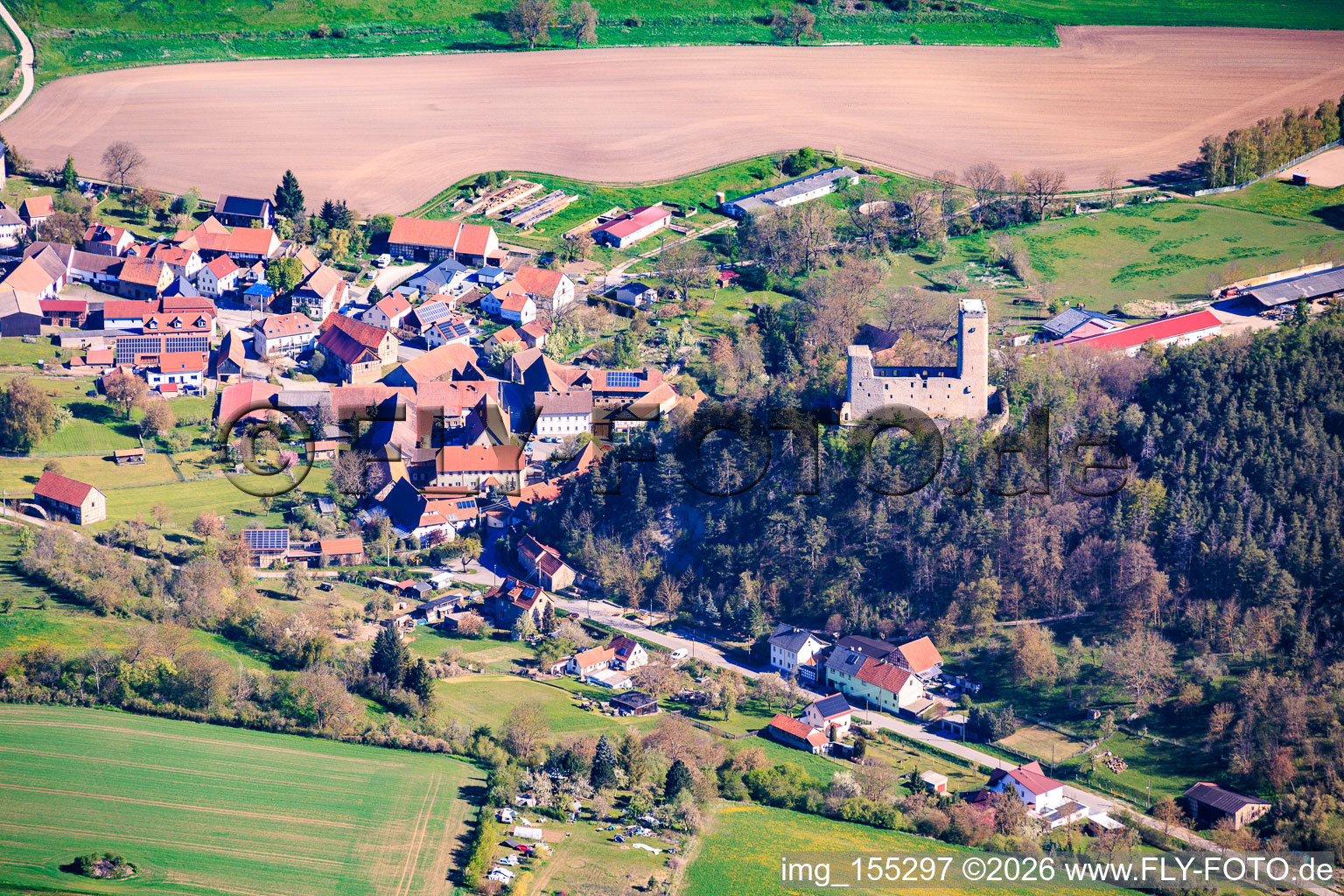 Village view from the south with castle ruins Ehrenstein in the district Ehrenstein in Stadtilm in the state Thuringia, Germany