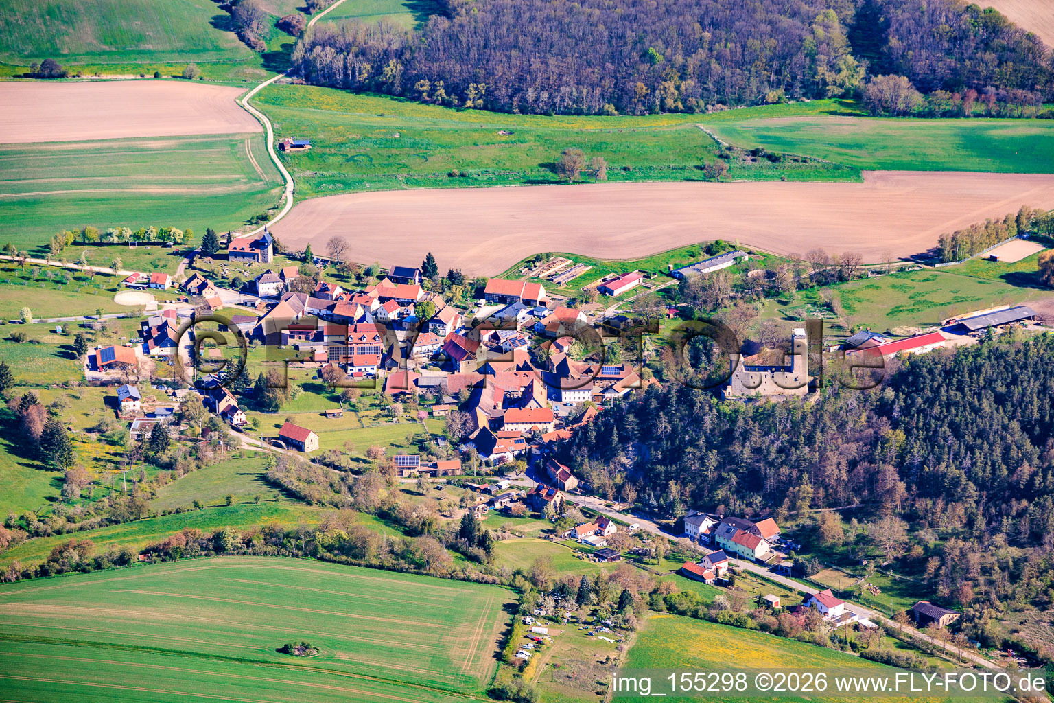 Village view from the south with castle ruins Ehrenstein in the district Ehrenstein in Stadtilm in the state Thuringia, Germany