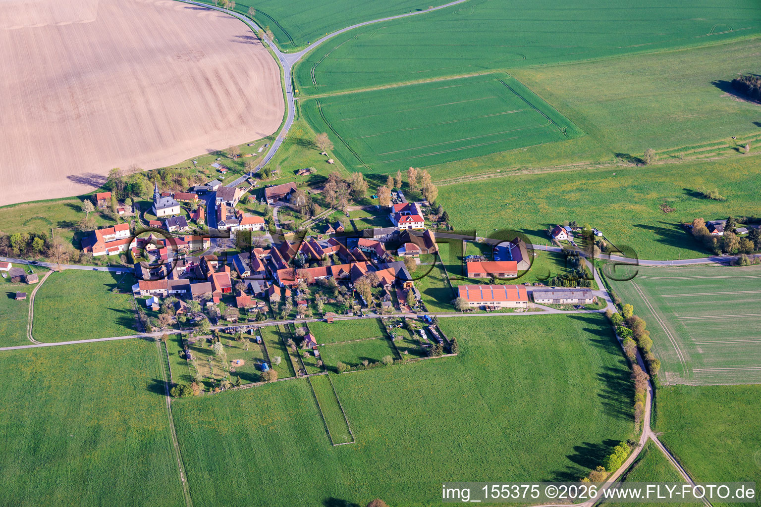 Village view with the village church of St. Martin from the northwest. in Moxa in the state Thuringia, Germany