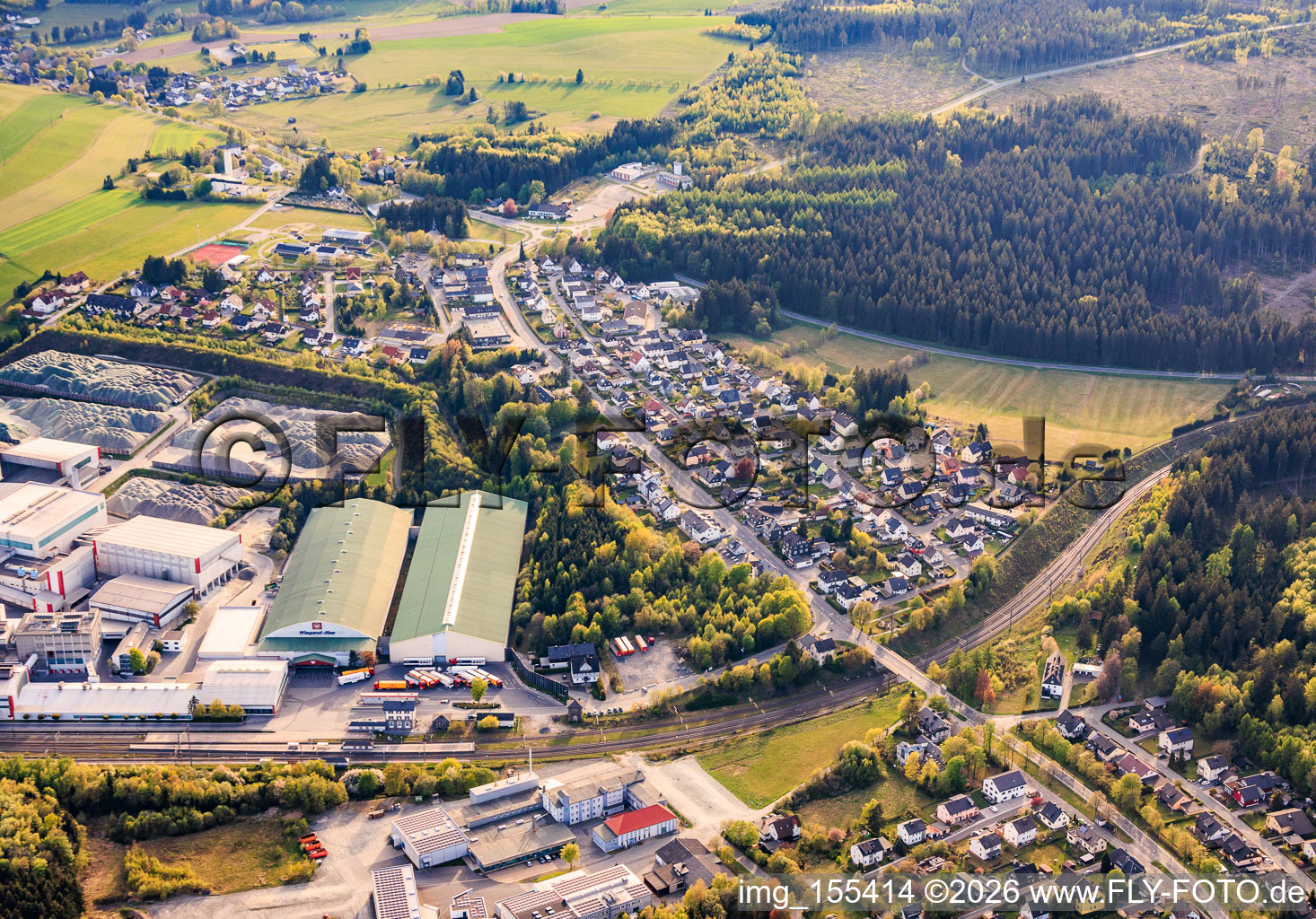 View of the town from the east, showing Wiegand-Glashüttenwerke GmbH and Bayerische Flaschen-Glashüttenwerke Vertriebs-GmbH. in Steinbach am Wald in the state Bavaria, Germany