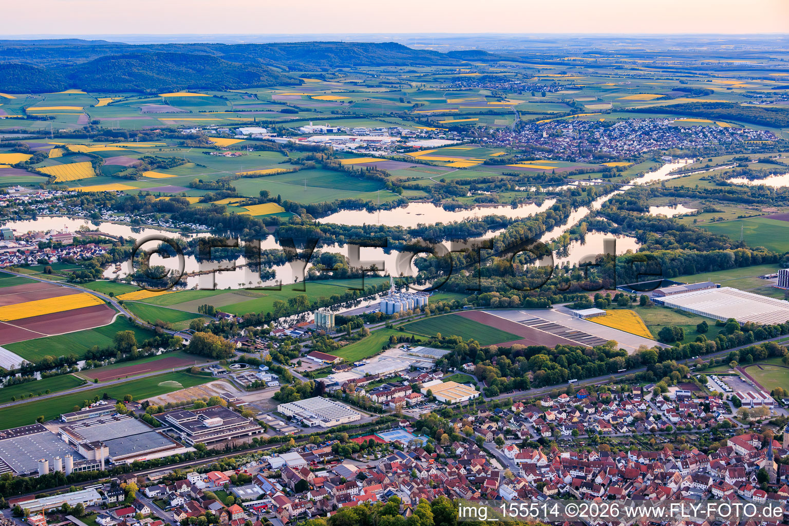 View of the town on the Main River with the Zuckergelände industrial park, Hafen Zeil GmbH, infire GmbH and MSG Knetzgauer Bucht in Zeil am Main in the state Bavaria, Germany