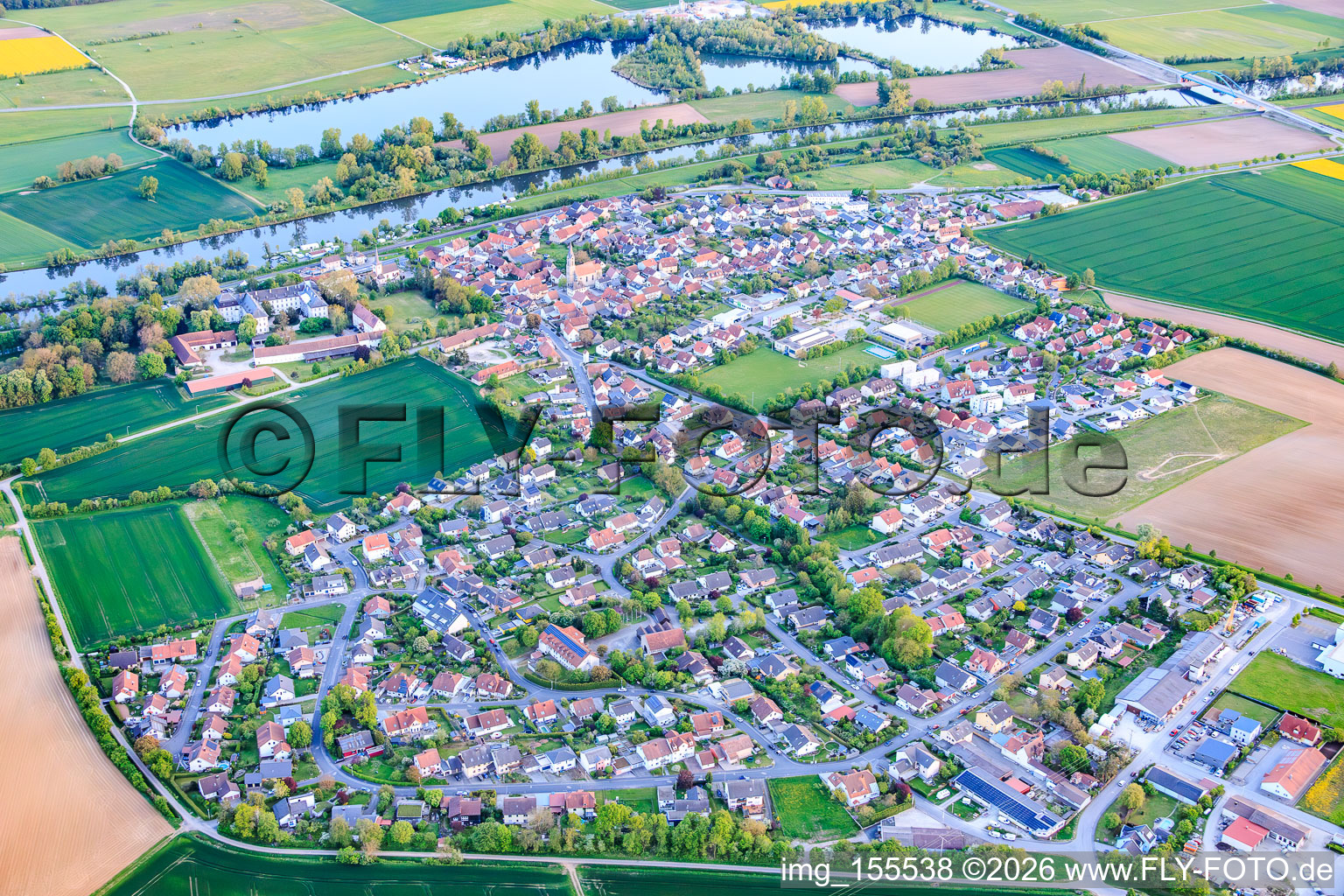 Village overview from the north on the banks of the Main River in the district Obertheres in Theres in the state Bavaria, Germany